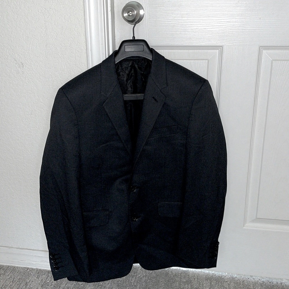 Black suit jacket with 2 exterior buttons and 6 internal ones.